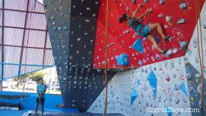 Indoor rock climber girl