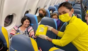 Cebu Pacific - flights from Manila to Sydney - safety protocols - travel safety - face mask - flight attendant - in-flight safety kit
