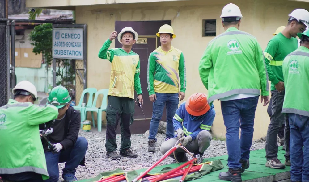 Negros Power and CENECO working together - power distribution utility - linemen at substation