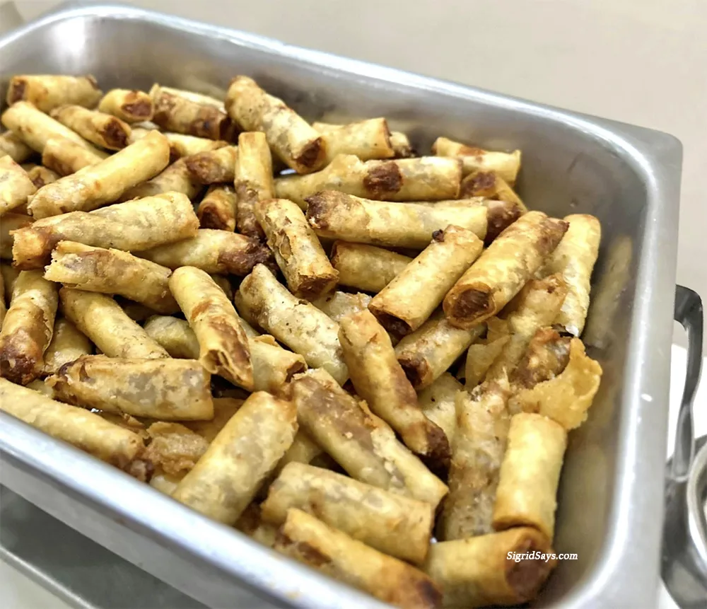 The Apollo Restaurant Hilado Lumpia Shanghai in a chafing dish for an event.