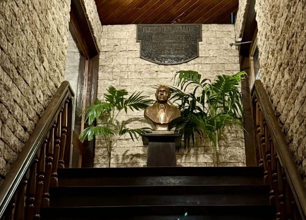 A bust of the founder, Dr. Vicente Sinco, sits at the Admin Building.