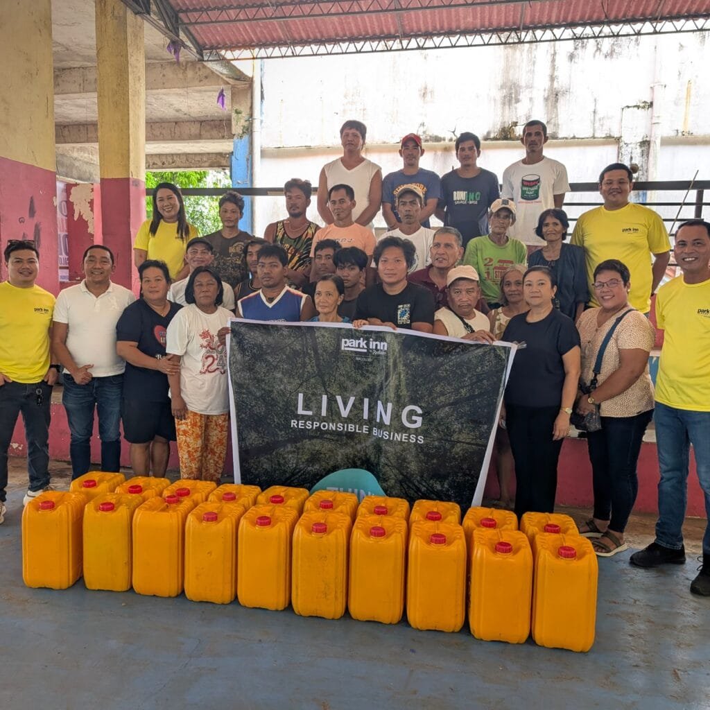 Beneficiaries of the Bio-diesel donation, together with Mr. Reljun Oloroso, Park Inn by Radisson Bacolod’s Director of People & Culture and Sustainability Champion.
